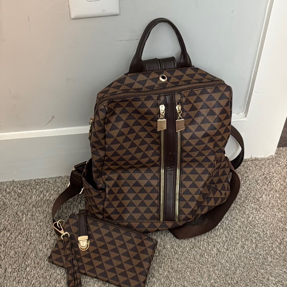 Brown Geometric Backpack with Gold Zipper and Leather Handles